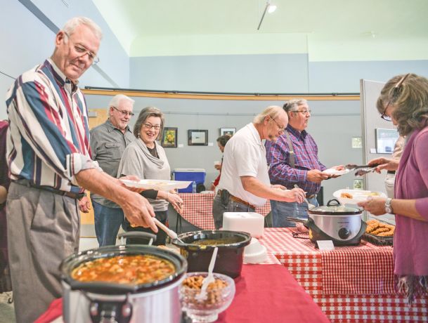 Singing for their supper: An all-day singing — shared voices, shared table