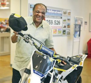Retiree wins prize — a motocross motorcycle