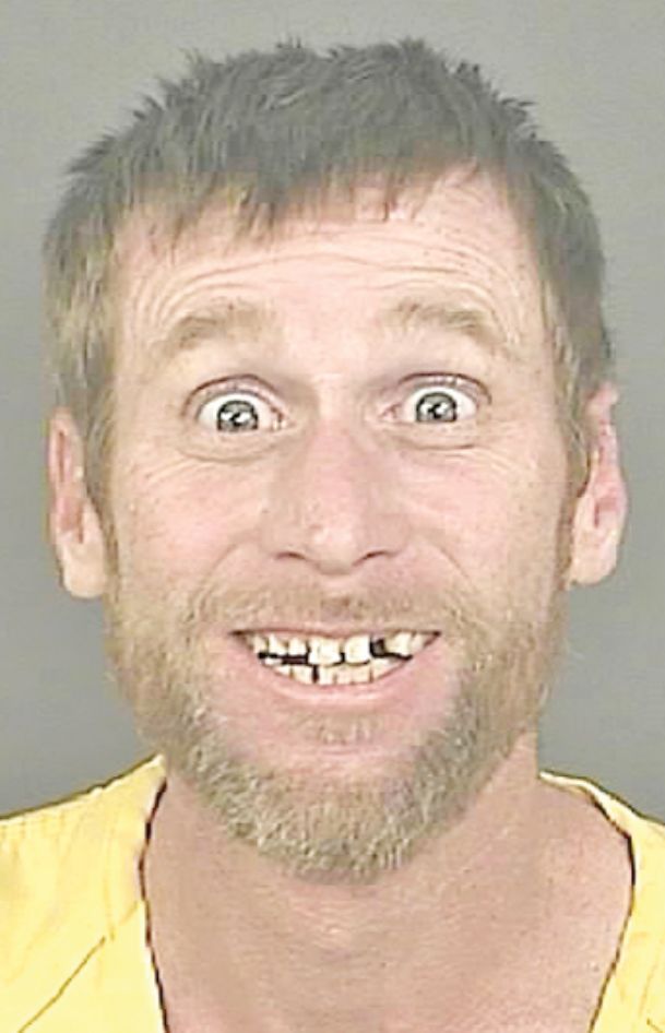 Big smile in Denver bank robbery suspect mug shot