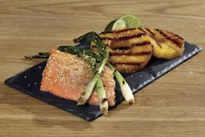 Grill fish and fruit for an appealing summer dish