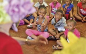 Kids spend summer playing outside, reading at Sim Scott Park Community Center