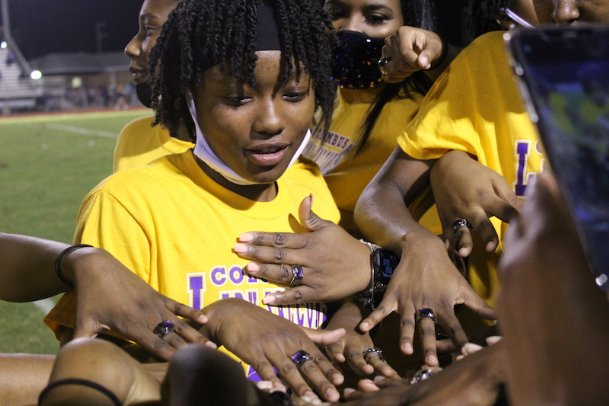‘The greatest feeling’: Columbus girls basketball team holds ring ceremony during football game against New Hope