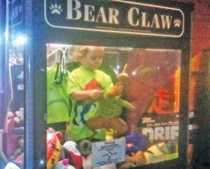 Toddler gets stuck inside claw machine