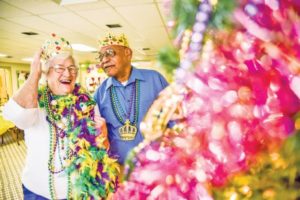 Starkville retirement home throws Mardi Gras party