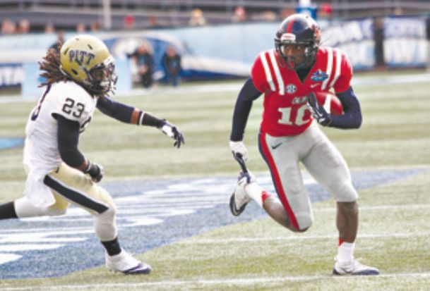 Record crowd watches Ole Miss finish with victory