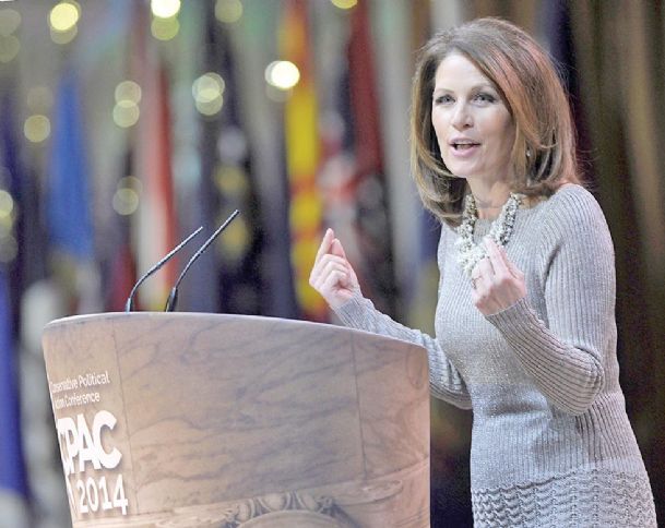 Bachmann blasts Clinton at summit