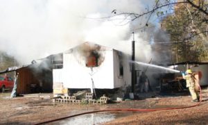 Husband rescues wife from burning home