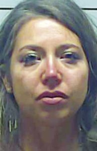 Brooksville woman behind bars after allegedly hitting store clerk with car