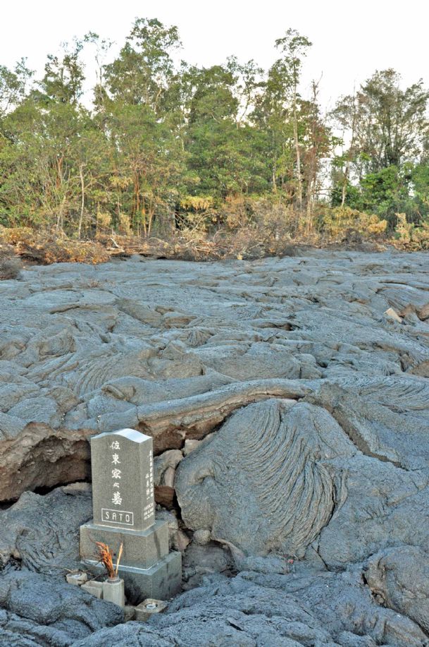 Lava spares family headstone in Hawaii cemetery