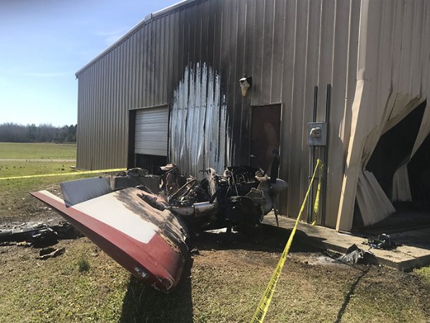 Plane collides with hangar, bursts into flames at Columbus-Lowndes airport