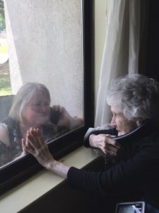 Profile: Mother, daughter make best of daily visits during nursing home lockdown