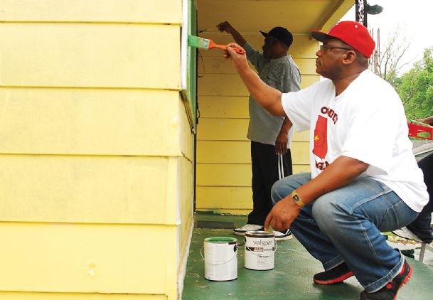 Area officials pitch in to ‘Paint the Town’