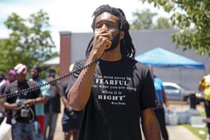 Protesters in Columbus urge overturn of Ricky Ball decision, call for unity