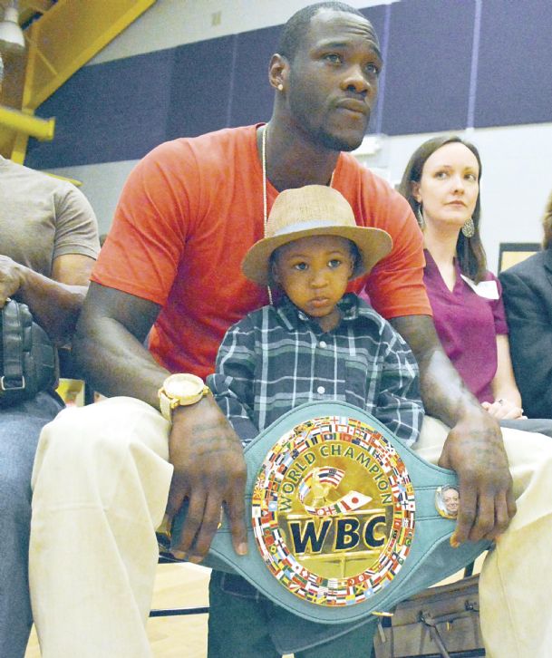 Champ addresses Columbus youth