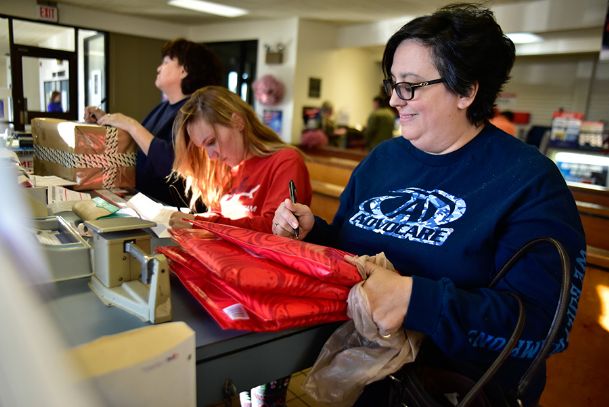 As Christmas approaches, post offices, delivery services hit peak season