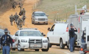 Neighbors: Suspect in Ala. standoff was violent