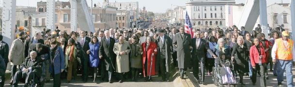 Biden leads re-enactment of voting rights march