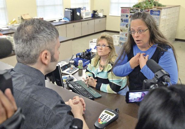 Clerk in gay marriage fight once unlikely to wage moral war