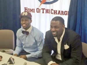 Newman, like his father, will wear maroon and white