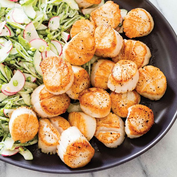 To brighten scallops, why not try a sugar snap pea slaw?