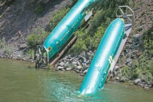 Derailed plane fuselages removed from Montana river