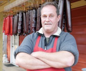 Staying busy in deer season: In the woods of Alabama, a South African butcher plies his trade