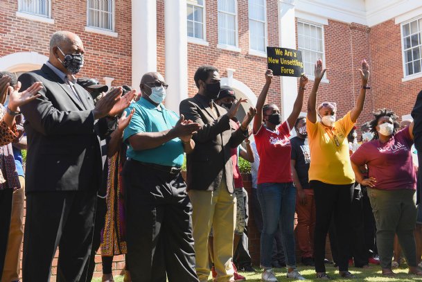 ‘It hurt me to my core’: Protesters, local officials gather at courthouse to call for Sanders’ resignation over racist comments