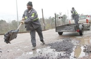 City workers scramble to fill potholes