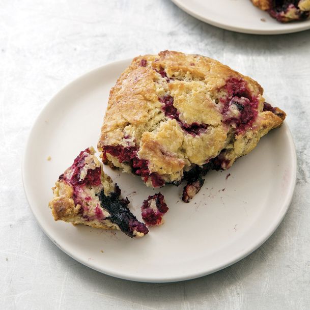 Berry scones that are a flaky, honey-glazed brunch delight