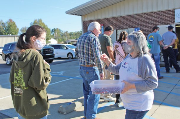 ‘It feels historic’: Despite long lines, pandemic safety measures, locals report steady voting process