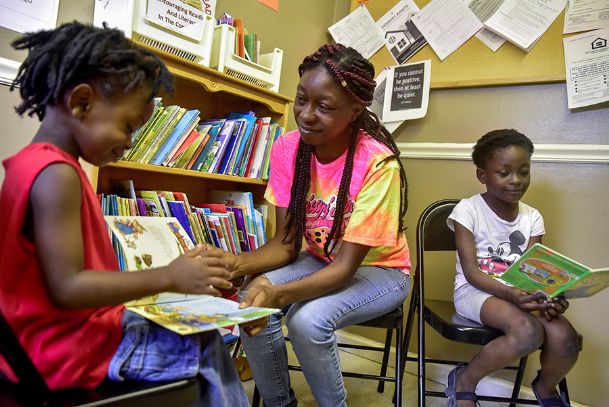 Spreading the love of reading: Women’s group brings ‘Library Love’ to low-income neighborhood