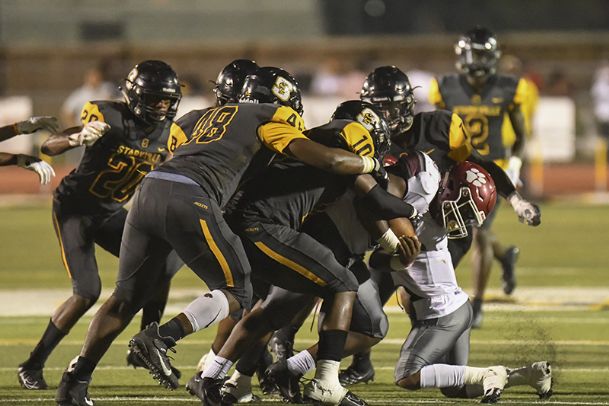 Starkville downs Louisville behind Altmyer, Yellow Jacket defense