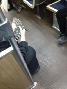 Images show woman on train with alligator