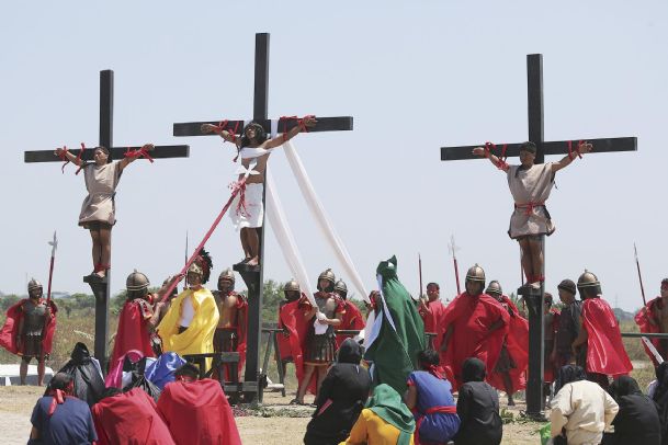Filipino devotees nailed to crosses in Good Friday rites