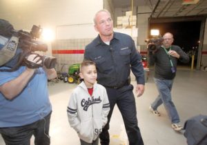 Abandoned boy meets Texas fireman who saved him