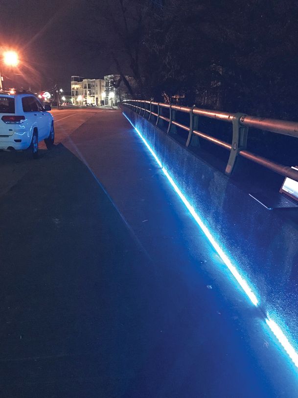 LED strip lights up University Drive bridge