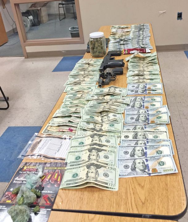 Officers arrest three suspects, find two ounces of pot
