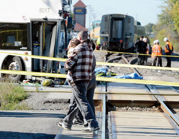 Six killed as Canada bus strikes passenger train