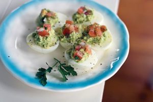A stuffed egg with a healthy kick — spicy avocado