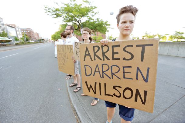 Picture emerges of officer in Ferguson shooting