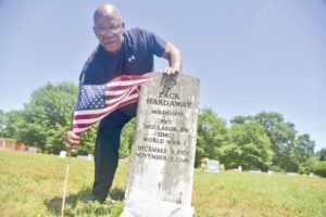 Veteran puts flags in African American cemeteries