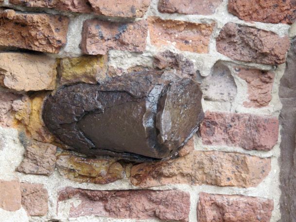 Civil War shells preserved in wall where they hit