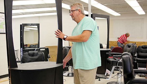 Learn to spike, taper, fade in new EMCC Barbering program