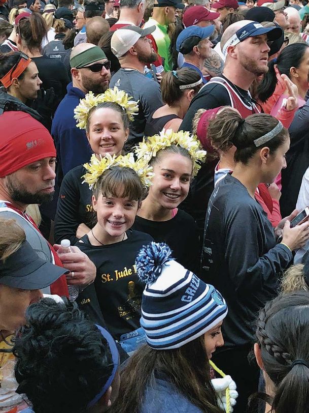 Finishing the race: Caledonia teen who battled childhood cancer runs St. Jude Marathon hand-in-hand with best friends