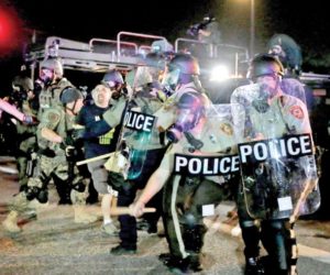 Police, protesters collide again in Ferguson