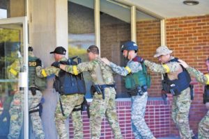 Disaster prep: First responders take part in active shooter drill on campus of MUW