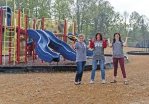Bidding the mud pit goodbye: Caledonia students running to raise funds for new playground surface