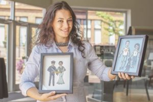 Portraits in paper: What’s an Italian architect doing in Columbus making paper dolls? Read on.