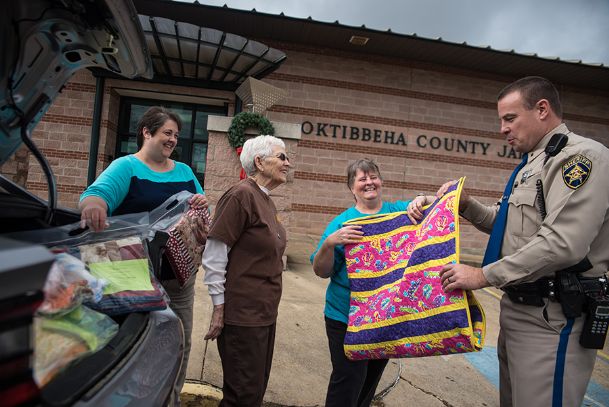 A measure of comfort: Quilters Guild gifts to sheriff’s office bring comfort in stressful times