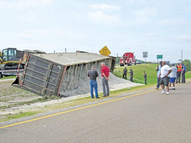 Semi takes spill on 82